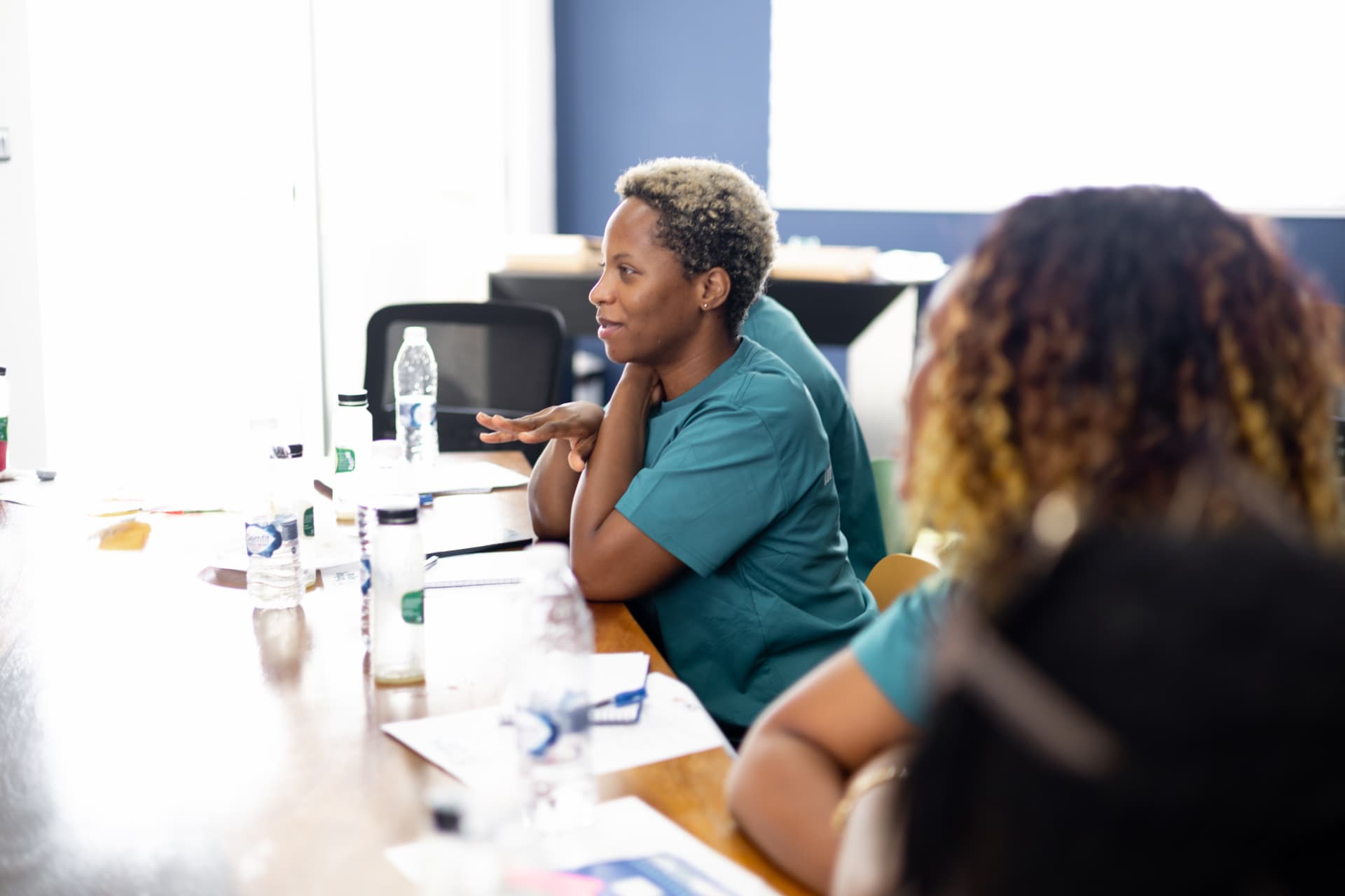 Two providers in conversation at the Urban Style training session